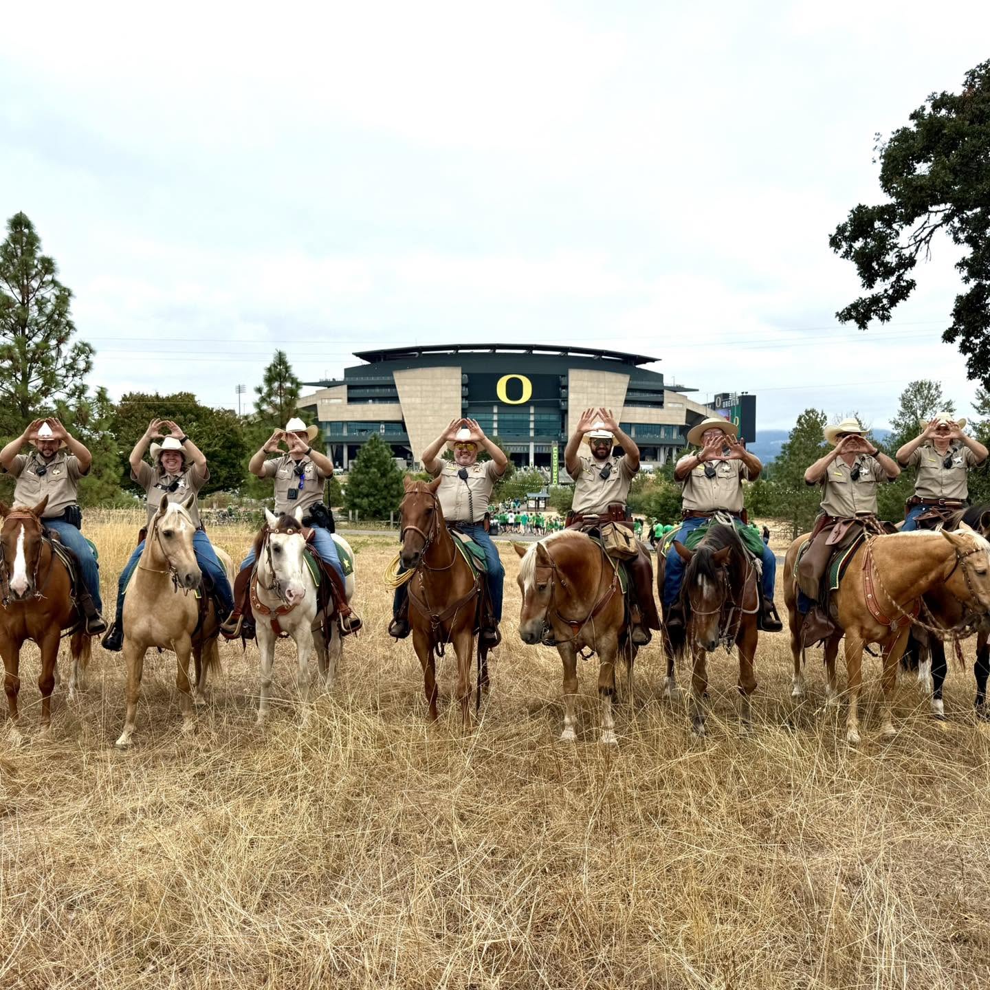 Mounted Lane County Sheriff's deputies at the University of Oregon